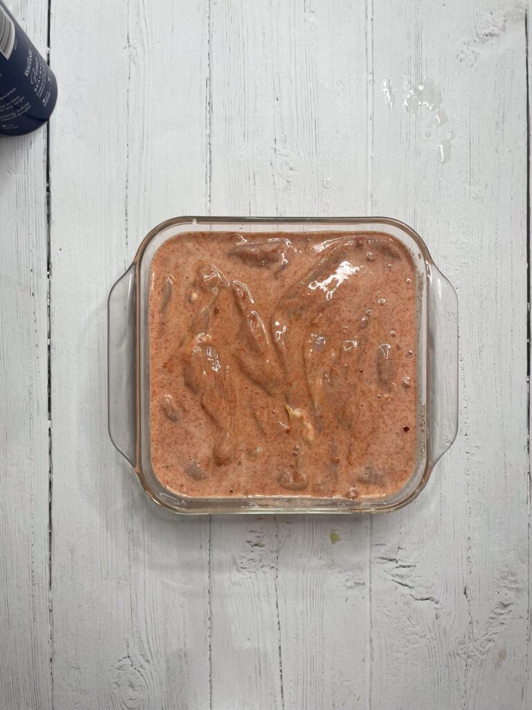 Chicken Breasts Marinating in Buttermilk